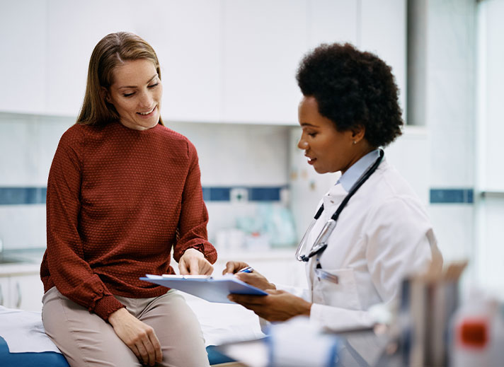 Doctor with adult patient.